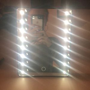 Makeup mirror with light